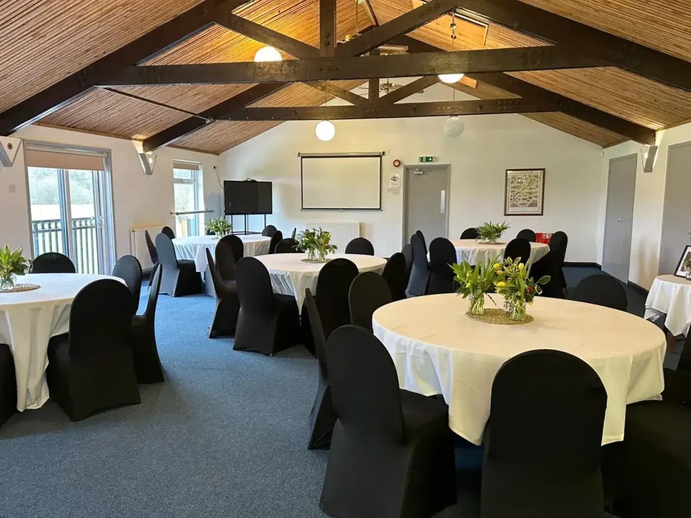 Function room set for a society dinner