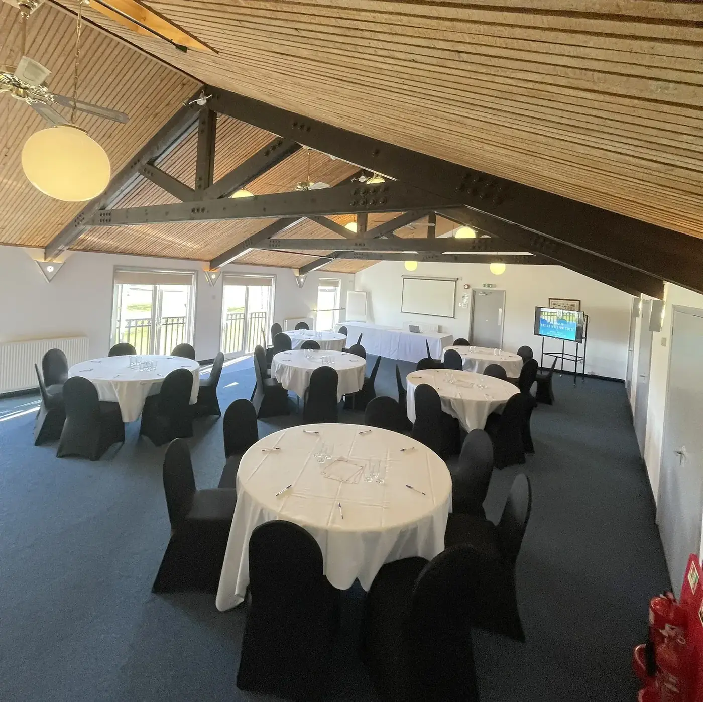 Beamed ceiling and dressed tables
