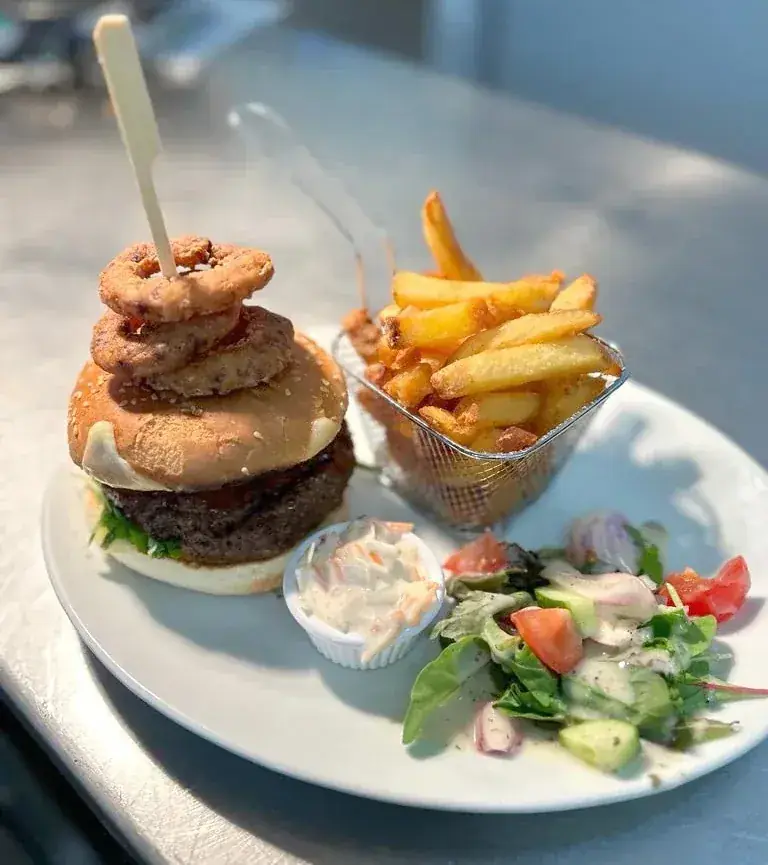 Burger and salad served in the clubhouse