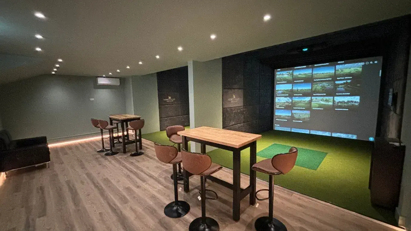 Simulator bay with bar seating